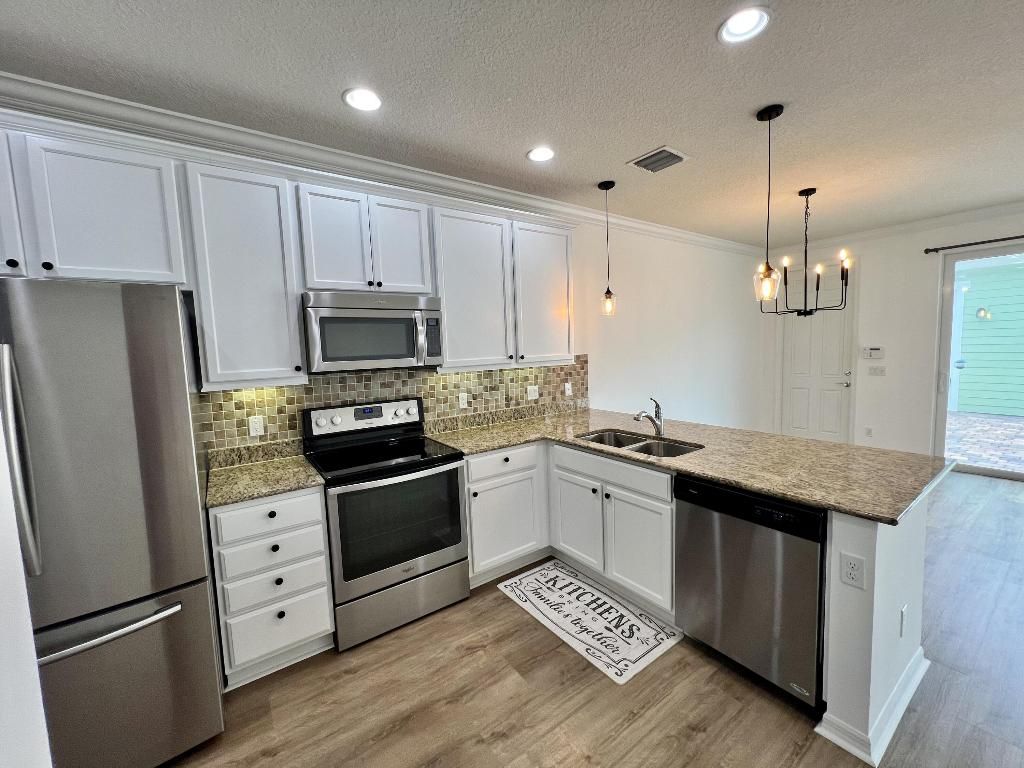 Photo of 1358 Turnbridge Drive, Jupiter, FL 33458 (MLS # R10967196)