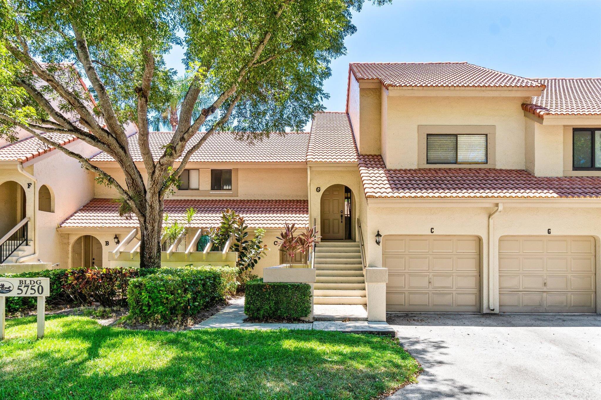 Nicely updated home with an excellent Central Boca location, just minutes from some of Boca's best shopping, dining, and recreation. Coach Houses is tucked away off St. Andrews Blvd, featuring tree-lined streets and low-density, coach-style homes with garages. Full hurricane protection with impact windows and doors. The updated kitchen features stainless steel appliances and granite countertops. Generous-sized bedrooms. Neutral tile flooring runs throughout the condo. Laundry room with a full-sized washer and dryer. The enclosed patio looks over open green space. Coach Houses has two pools (one heated) and walking trails. The Boca Swim and Racquet Center is next door, which features 26 Har-Tru courts, swimming pool, playground, and splash pad. Live amongst Central Boca's best!