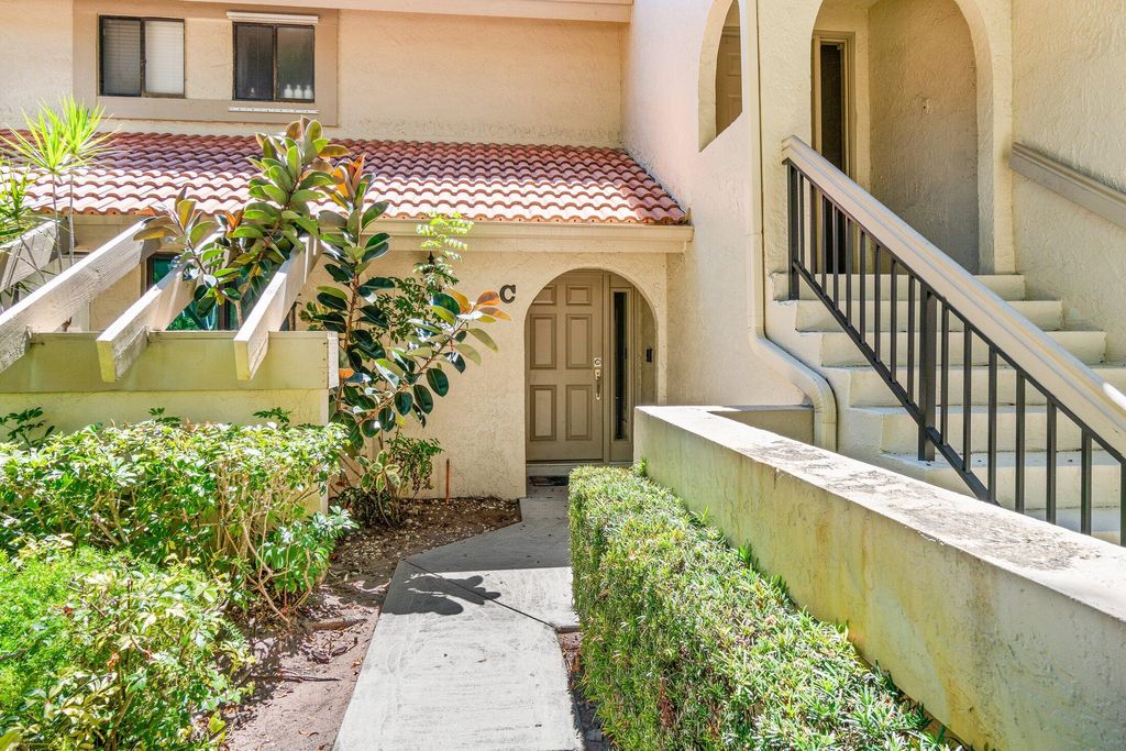 Photo of 5750 Coach House Circle #C, Boca Raton, FL 33486 (MLS # R11134053)