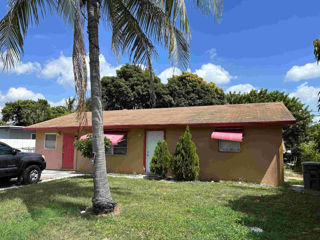 Photo of 1191 Highland Road, Lantana, FL 33462 (MLS # B26068225)