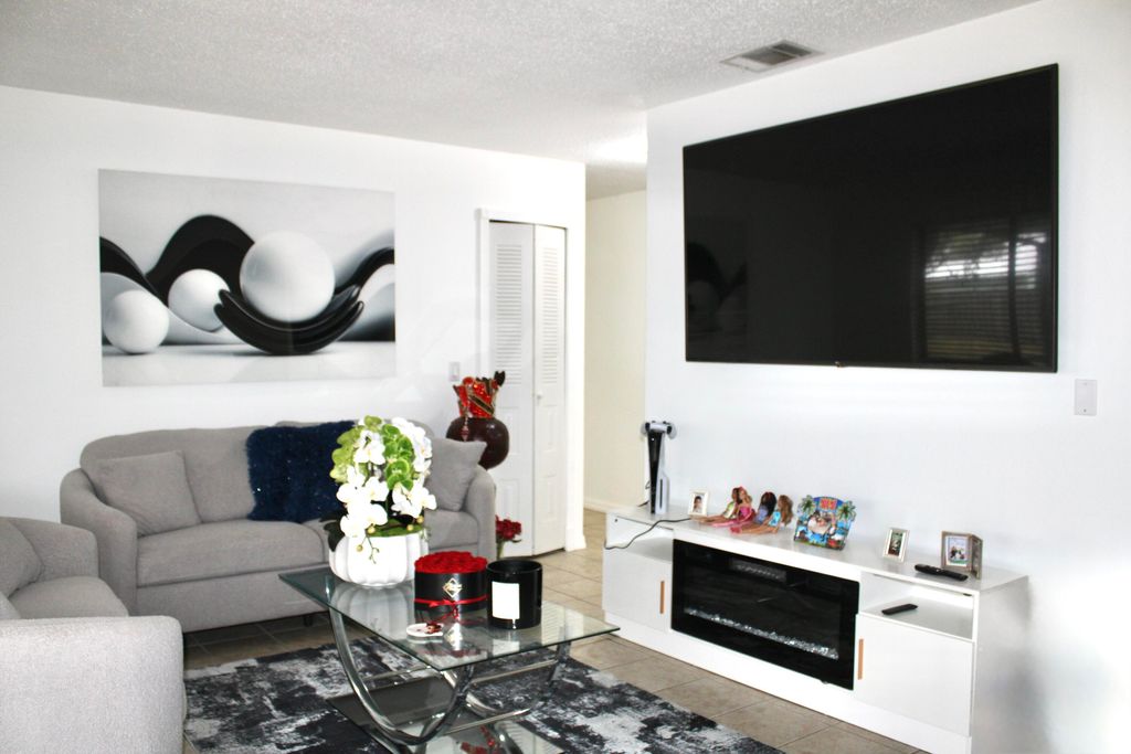 Photo of 2533 SE Grand Drive, Port Saint Lucie, FL 34952 (MLS # R11156085)