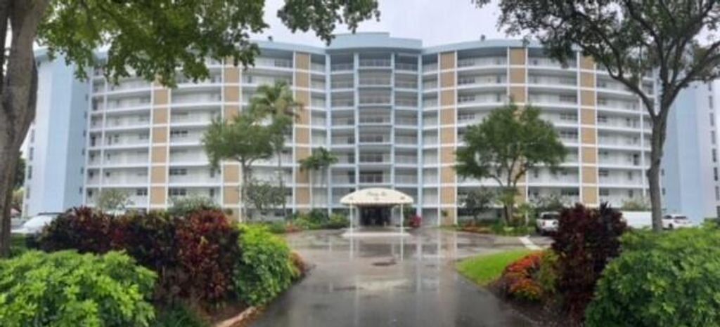 Photo of 3010 N Course Drive #312, Pompano Beach, FL 33069 (MLS # B26023301)