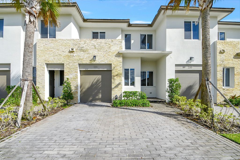 Photo of 220 Pioneer Way, Royal Palm Beach, FL 33411 (MLS # B26038736)