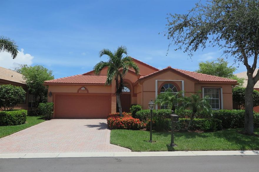 Spectacular lake views from this one story 3 bedroom 2.5 bath single family home. Popular floor plan features split bedrooms, large family room and living room, foyer and kitchen with breakfast area.  
 Roof replaced!  Large white tile throughout living areas.  Accordion hurricane shutters.  Extra large screened in patio. 
 A/C replaced.  Don't miss this one! 
 Membership optional