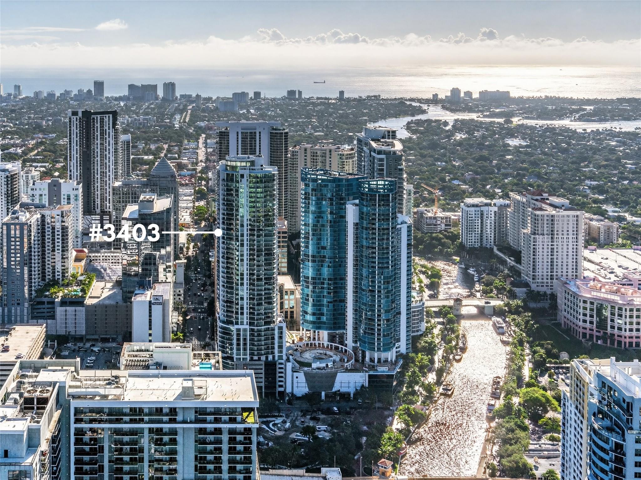 Over 3,000 sq ft of Indoor + Outdoor Living with Panoramic Views of the river, skyline, Huizenga Park & the ocean. 
This 3-bedroom + den has the most open floor plan downtown, upgraded tile flooring & a rare combination of white & espresso cabinetry that offers flexibility for any design vision.
Additional upgrades include motorized shades, Nolte cabinetry, quartz countertops, and more.
Currently furnished with high-end pieces from Roche Bobois & Bloomingdale’s (furnishings available for purchase). 
Includes 2 side-by-side garage parking spaces by the elevator (one oversized) + storage unit. 
Located above Eddie V’s & Harborwood, just moments from Las Olas Boulevard’s dining, shopping, entertainment & more.
This condo has incredible space, finishes, parking & views!