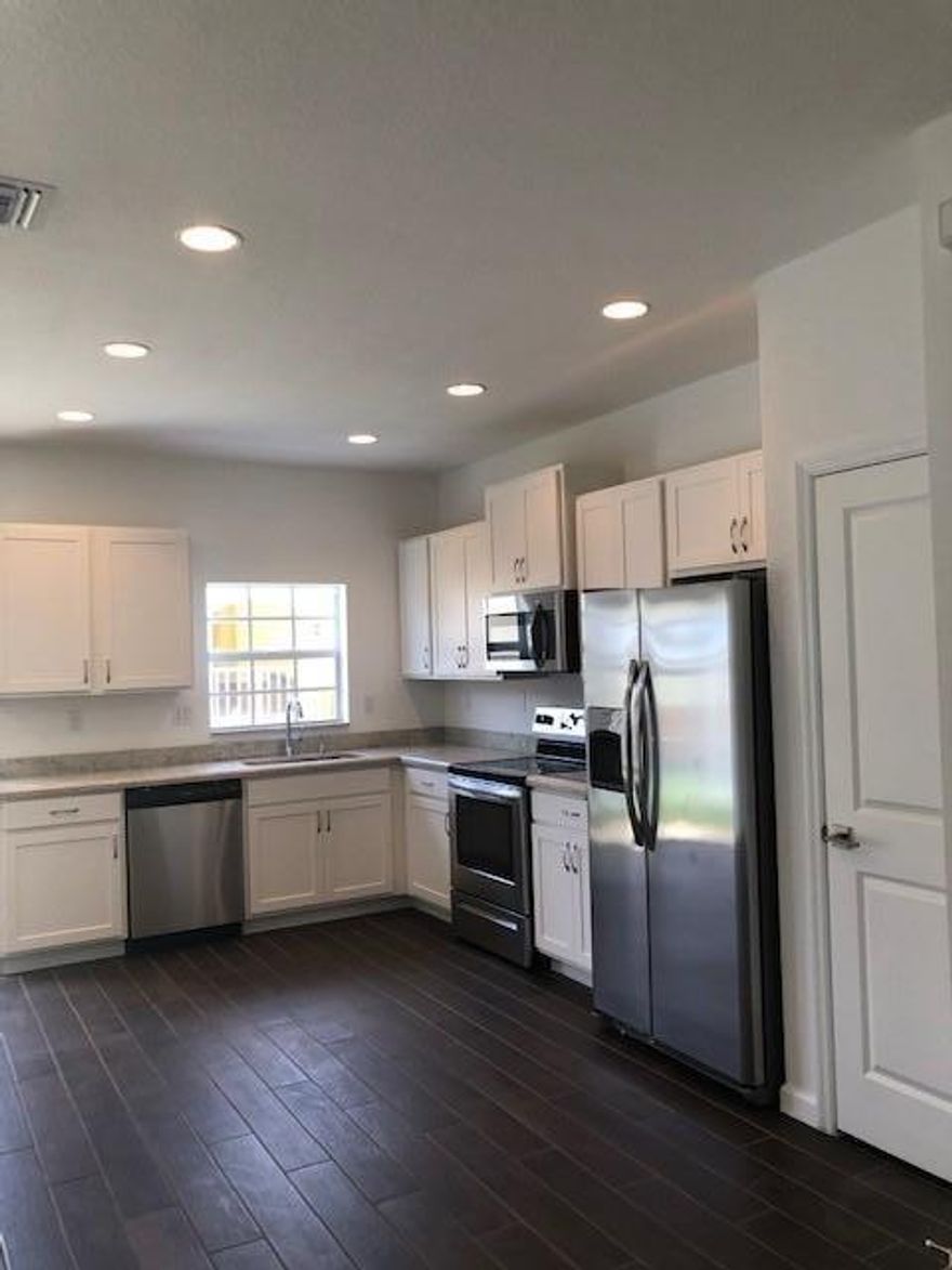 Located minutes from FL Turpike, I-95 and 595. Two exits from FLL Airports and Port Everglades. Brand New Construction - Virtual Gated Community - open home plan, 3 bed/2.5 bath, S/S Kitchen Appliances, white cabinets, granite kitchen counters with ''wood look'' plank tile throughout living area. 1-car garage and double driveway. Within minutes of Las Olas, Sawgrass Mills Mall and Plantation Hospital. A must see. Schedule today! BRAND NEW HOME! CALL FOR A TOUR AND MOVE IN SPECIALS- Restrictions may apply *Pictures, photographs, features, colors and sizes are approximate for illustration purposes only and will vary from the homes as built. 
These photos are not of the actual home but are similar to the home being built.