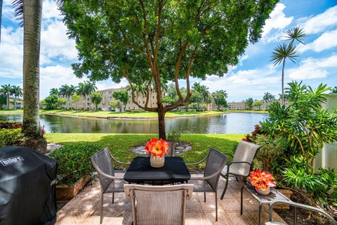 Photo of 12560 Majesty Circle #104, Boynton Beach, FL 33437 (MLS # B26038384)