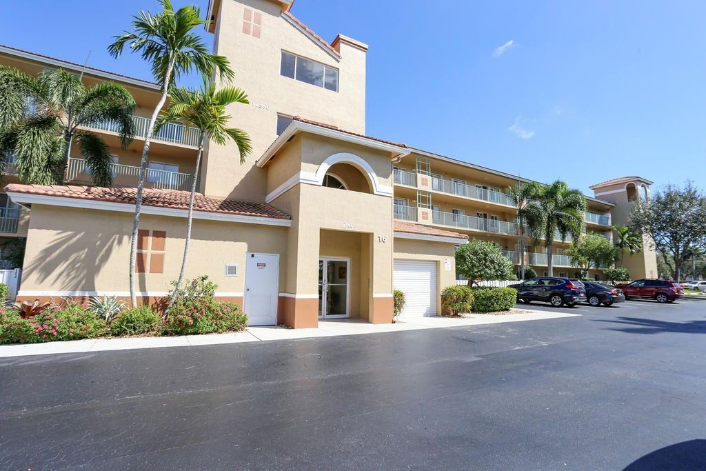 Photo of 12560 Majesty Circle #104, Boynton Beach, FL 33437 (MLS # B26038384)