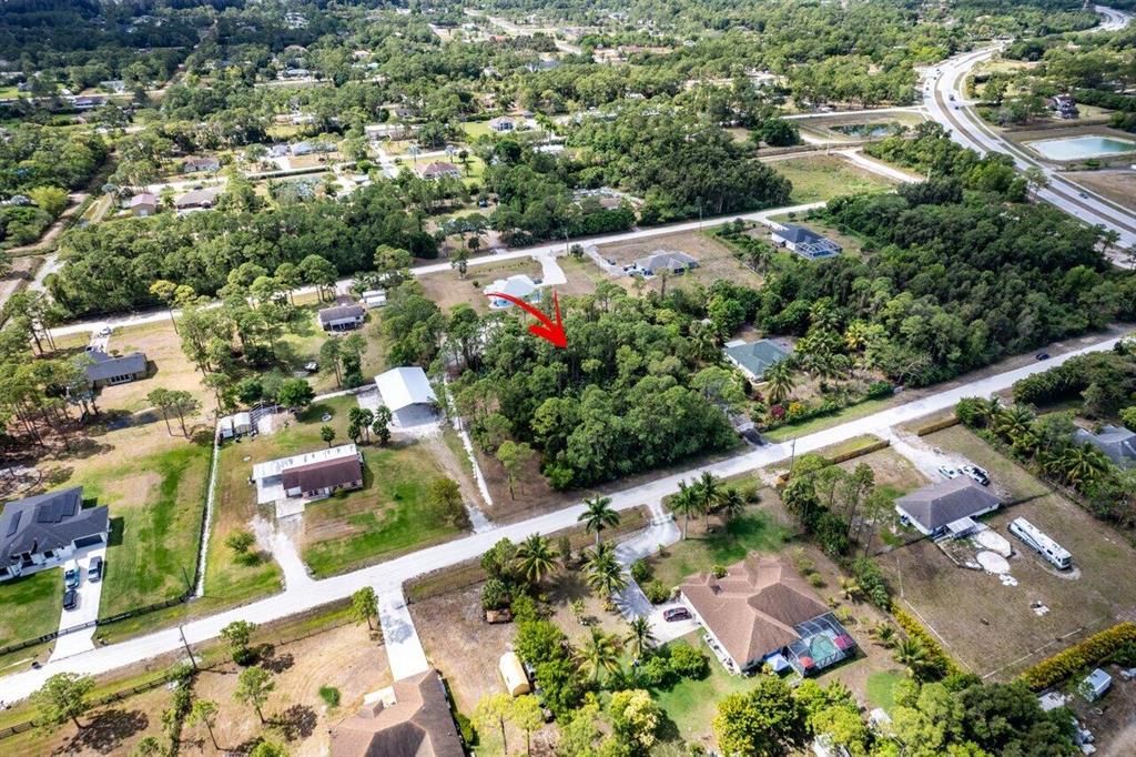 Welcome to your dream homesite! This vacant piece of land in the beautiful acreage of Florida offers endless possibilities for building your dream home. This expansive piece of land is located in the serene and picturesque acreage of Florida, known for its natural beauty, lush greenery, and peaceful atmosphere. The property is conveniently situated in a desirable location, offering easy access to major roads, schools, shopping centers, and other amenities, while still providing the privacy and tranquility you desire.