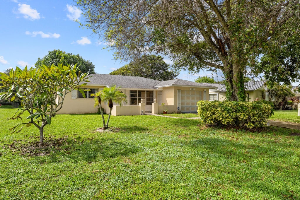 Photo of 138 Sandpiper Avenue, Royal Palm Beach, FL 33411 (MLS # B26084875)