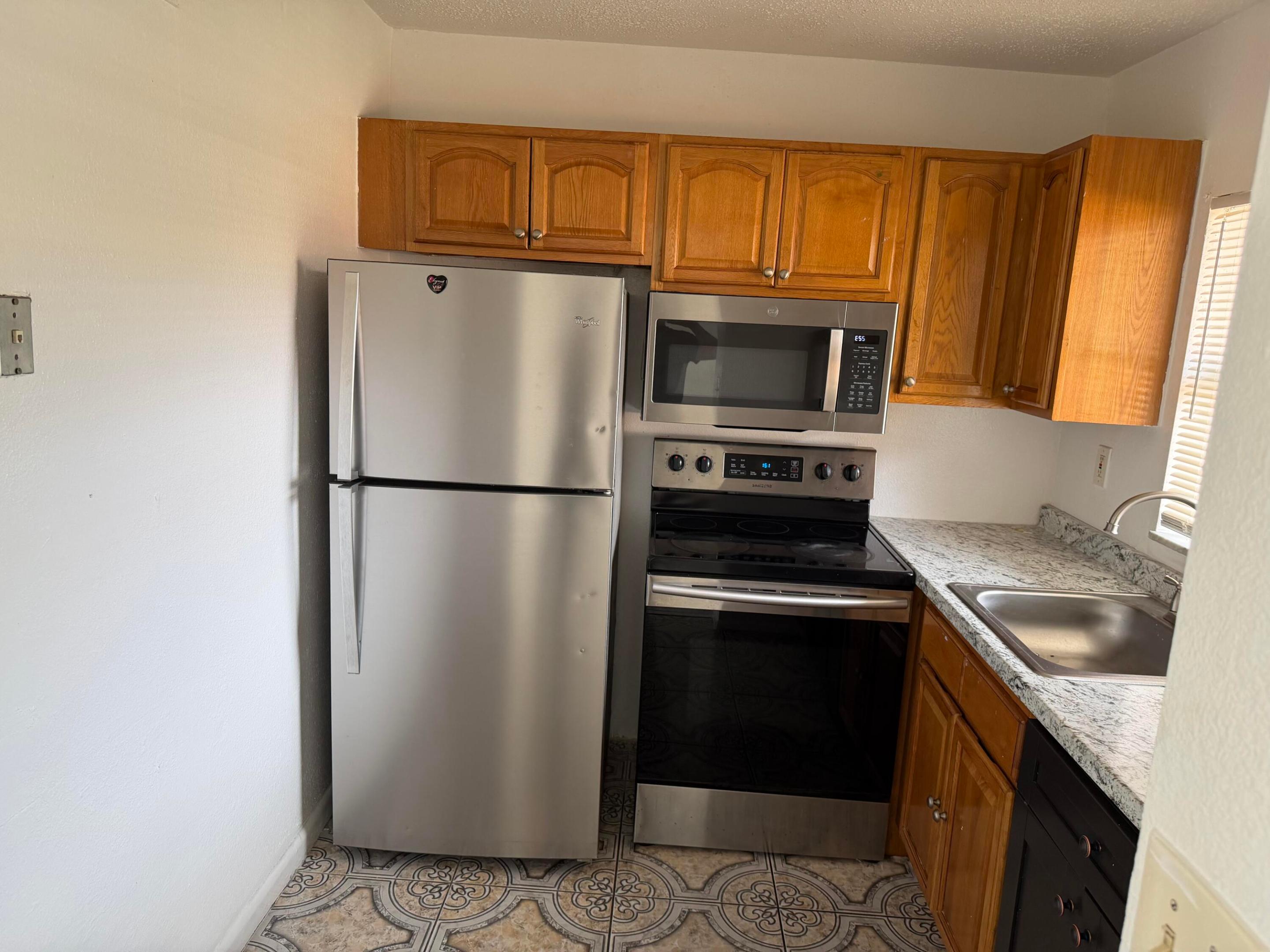 GARDENS AT LAUDERHILL CONDO - Residential