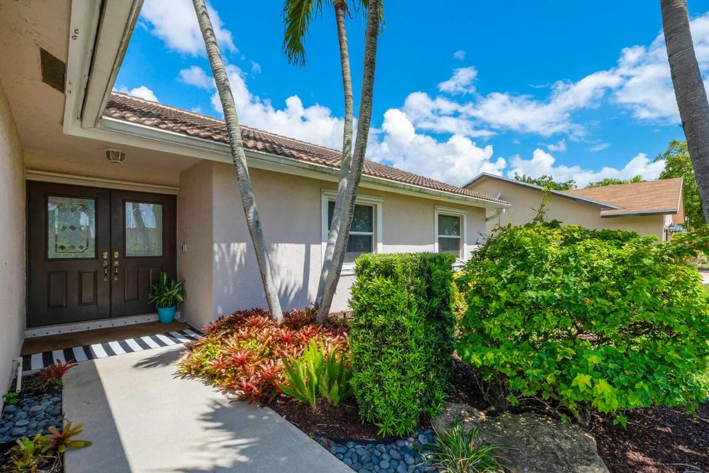 Photo of 7661 W Country Club Boulevard, Boca Raton, FL 33487 (MLS # R11139267)