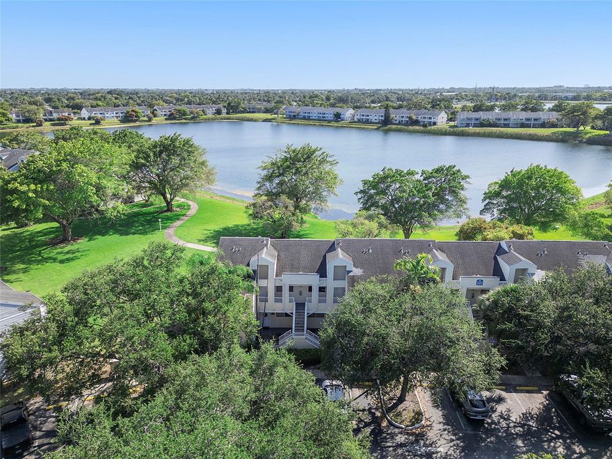 Stunning 2BR/2BA, Spacious, desirable condo in highly sought-after gated Summerlake community with exceptional amenities. Offers breathtaking views of lake. This light-filled 2nd floor unit features soaring cathedral ceilings throughout, large designer white porcelain tile creates an airy, elegant atmosphere. The modern kitchen showcases sleek white paneled cabinetry, warm granite counters. The oversized primary bedroom includes a spacious walk-in closet, private en-suite bath & quartz countertop. The 2nd BR bathed in natural light boasts a custom-built 10-ft wardrobe system with high-gloss white sliding doors, sensor lighting, specialized accessory shelving—ideal for maximizing space. This designer condo offers comfort, convenience & perfect location close to shops, restaurant & beaches.
