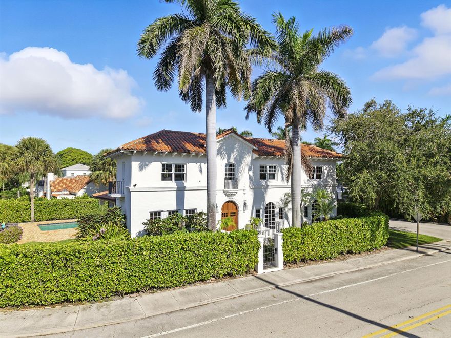 This was a Netted Sale. Welcome to 3201 N Flagler Drive located right across the intracoastal waterway in one of West Palm Beach's highly sought after areas, Northwood Shores. Enjoy the best of West Palm Beach living in this 1925 Spanish-inspired estate just moments from Flagler's most popular waterfront restaurants, and social hotspots. Step through the front doors into a timeless foyer where a hand-carved cast stone staircase makes a prominent first impression. Off the foyer, a charming family room with French doors flows directly to the pool area, while the grand living room showcases rich hardwood floors and a pecky cypress beam ceiling. The bright, all-white kitchen with honed marble counters is complemented by a formal dining room designed for entertaining.