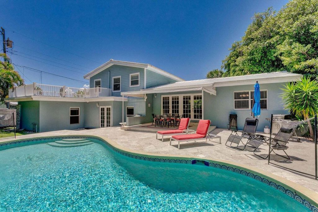 Photo of 1310 Manor Drive, Singer Island, FL 33404 (MLS # R10913549)