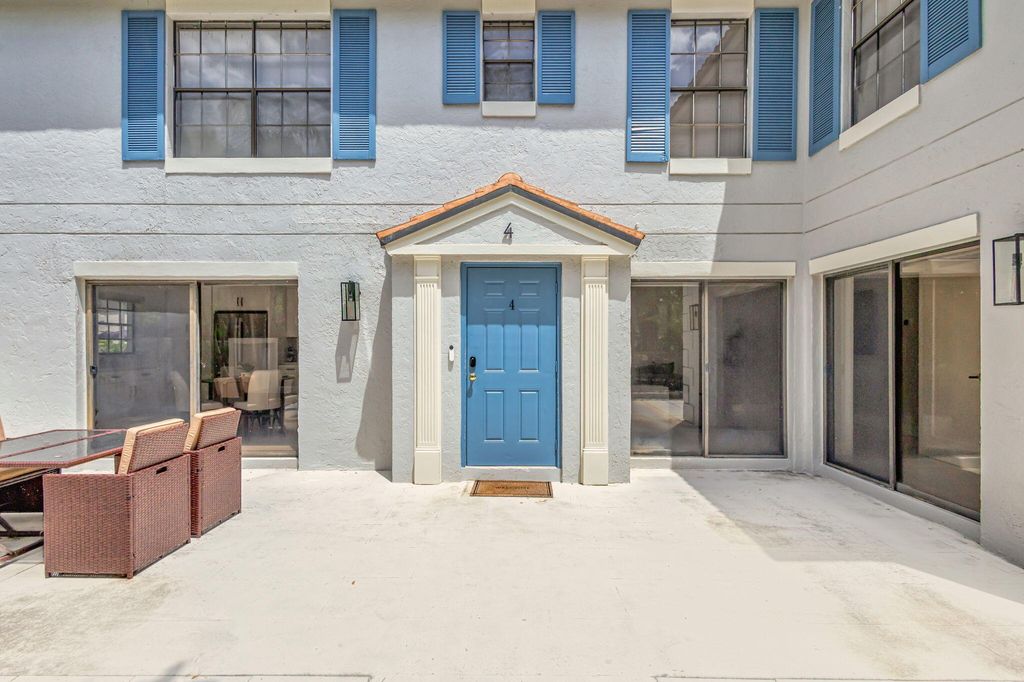 Photo of 355 Prestwick Circle #4, Palm Beach Gardens, FL 33418 (MLS # R11067903)