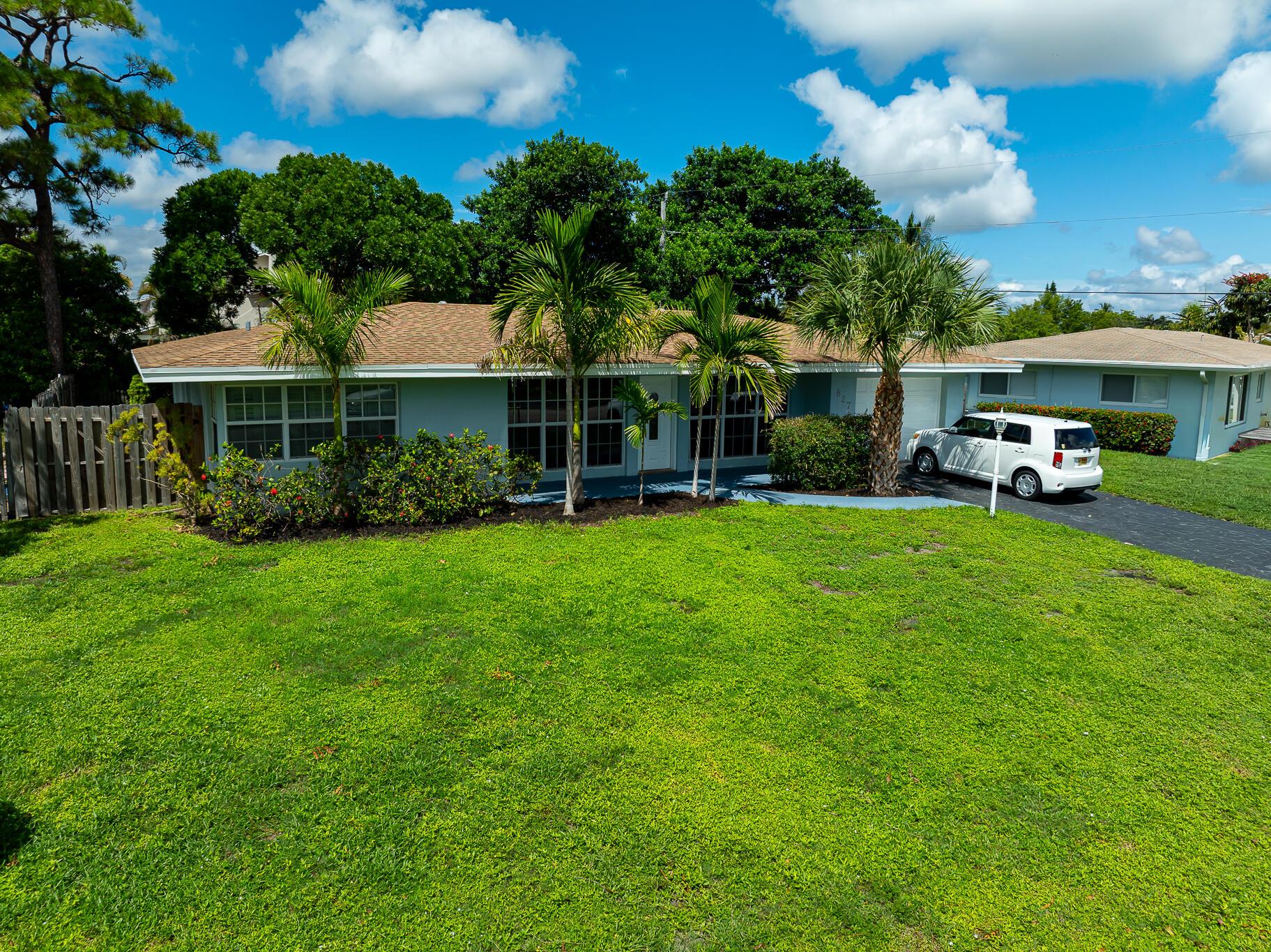 WELCOME HOME to 827 SE 10th Terrace in the highly sought after Cove neighborhood. This residence offers the perfect blend of coastal living with modern updates. Ideally situated east of Federal, enjoy the convenience of walking, biking or take your golf cart to the beach, intracoastal plus great restaurants and shopping. This spacious 2/2 home boasting 1742 sf of living space provides the flexabilty to easily add a 3rd bedroom or office. Brand new kitchen in 2024. Step outside to a huge fenced backyard with plenty of room for a pool or creating your own private oasis. The attached garage offers abundant storage for all of your toys-all nestled on a quiet street. This home is priced to sell below market value and will not last! Bring your beach towels and start living the Cove lifestyle!