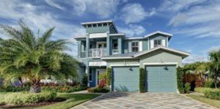 Stunning Key West Style Residence steps from the Beach.  This Luxurious home boasts 4 bedrooms, 4.5  bathrooms, decorated in white and gray tones, Gourmet Kitchen with exotic quartz counters & Thermador appliances, First Floor Master Suite overlooking tropical backyard and spillover pool, Downstairs office, Three ensuite Bedrooms upstairs with a loft area and media room, private laundry room, concrete construction, metal roof as well as paver drive and patio.  Boca Raton Riviera is one of Palm Beach Counties most sought after Seaside Communities.