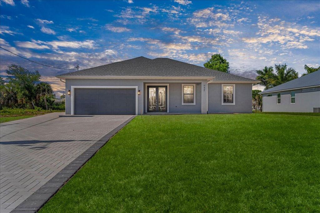 Photo of 7427 Sea Mist Drive, Port Charlotte, FL 33981 (MLS # B26012668)