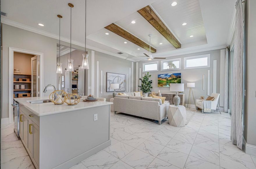 Located on an oversized lakefront site with long golf views, this pre-construction home awaits you. The Cecelia-Basile plan features 4 bedrooms & 2.5 bathrooms. The family room, kitchen, & dining area feel open & airy, with 12-foot-high ceilings, large windows, & 10-foot-high sliding doors. The kitchen features easy-close cabinets with dovetailed drawers, a natural gas cooktop, a wall oven, and a fridge. The quartz-topped island is large enough to accommodate 4-5 bar stools. The Greatroom features crown molding, a tray accent ceiling, and three transom windows. The primary suite features crown molding, a tray ceiling, large windows, an expansive walk-in closet, plus in the bathroom, double vanities, a soaking tub, and a walk-in glass shower. Call today to make your selections or upgrades.