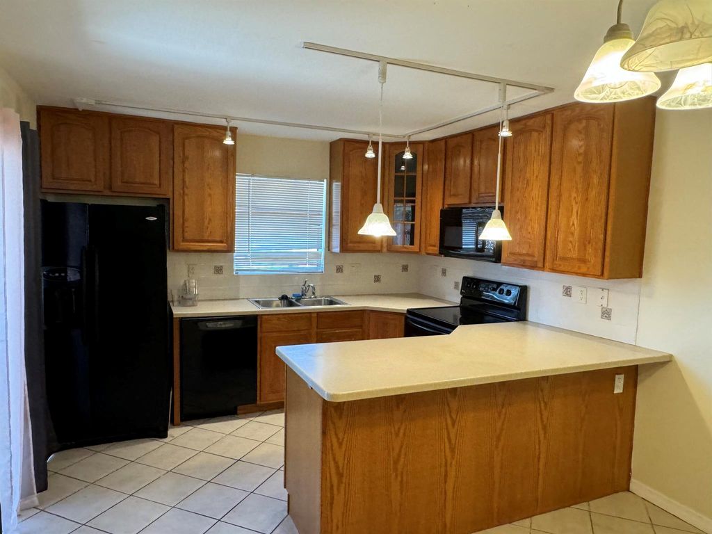 Photo of 1402 Nebraska Avenue #3c, Fort Pierce, FL 34950 (MLS # R10969223)