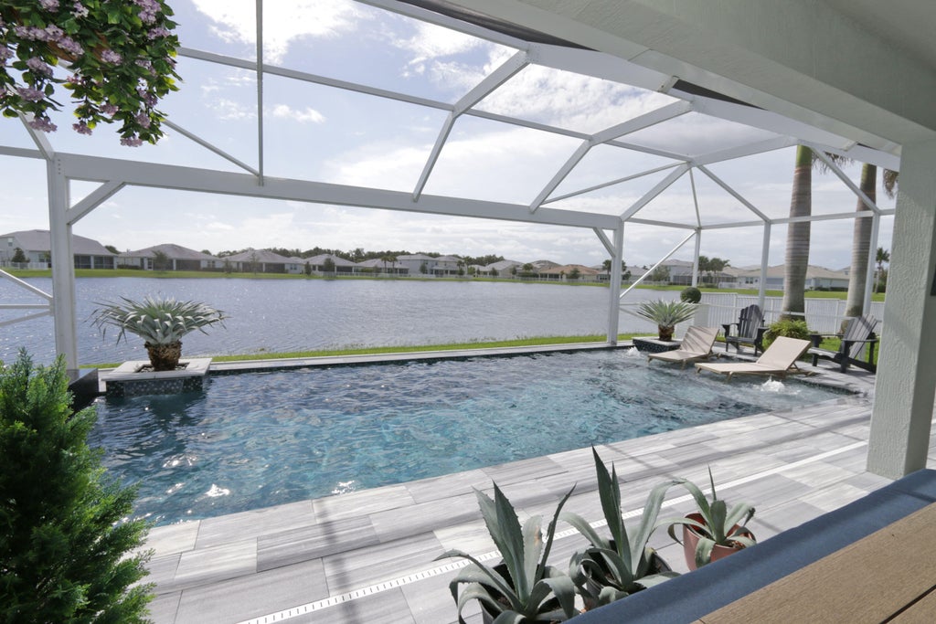 Photo of 12557 SW GRAY FOX Lane, Port Saint Lucie, FL 34987 (MLS # B26078167)