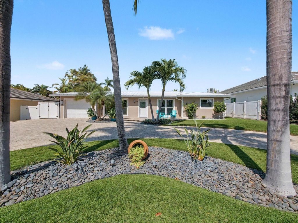 Photo of 219 Blossom Lane, Palm Beach Shores, FL 33404 (MLS # F10555951)