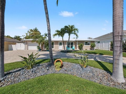 Photo of 219 Blossom Lane, Palm Beach Shores, FL 33404 (MLS # F10555951)