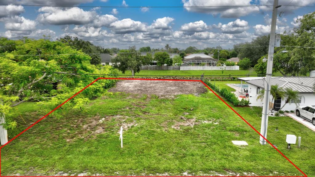 Photo of 2583 SW Chestnut Lane, Port Saint Lucie, FL 34953 (MLS # R11072847)