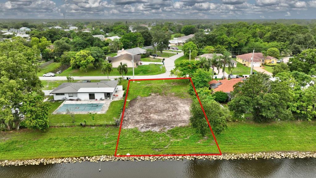 Photo of 2583 SW Chestnut Lane, Port Saint Lucie, FL 34953 (MLS # R11072847)