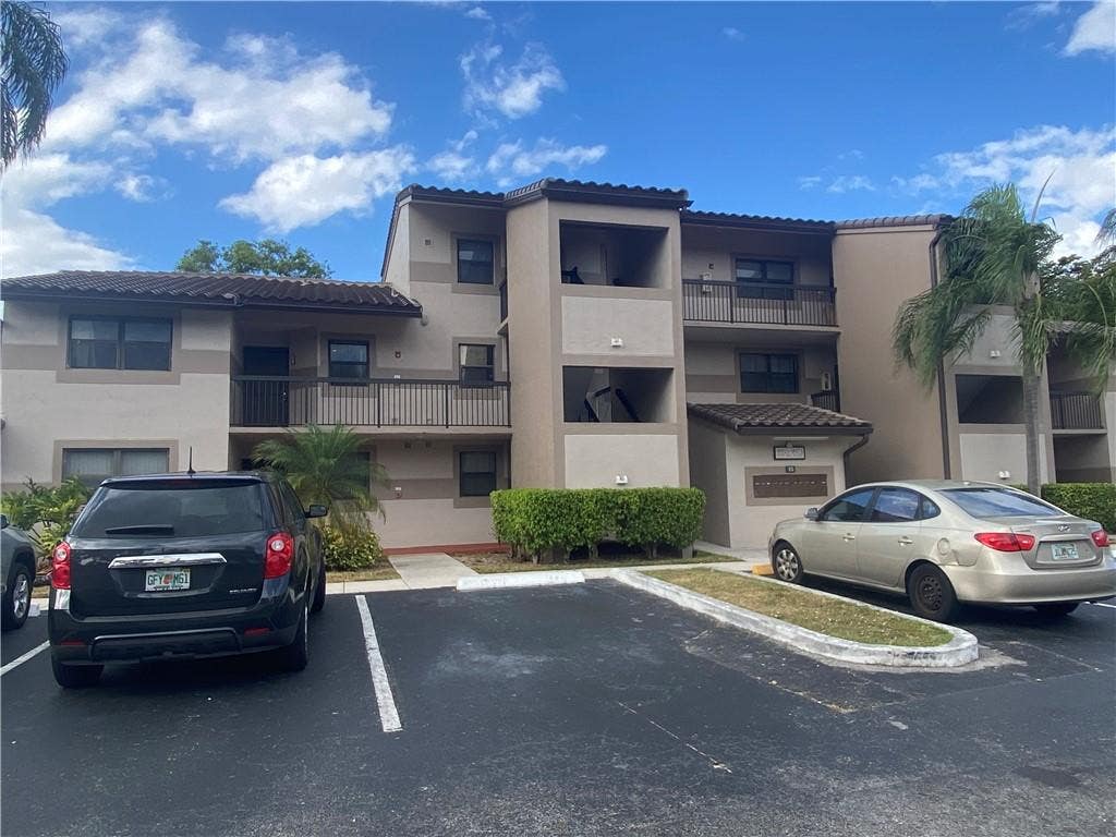 Photo of 9957 NOB HILL Place #9957, Sunrise, FL 33351 (MLS # B26062057)