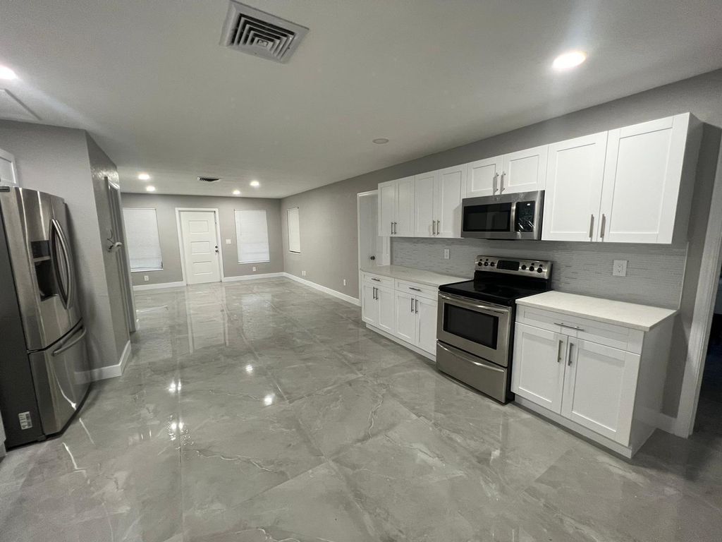 Photo of 129 Euclid Boulevard, Lantana, FL 33462 (MLS # B26027749)