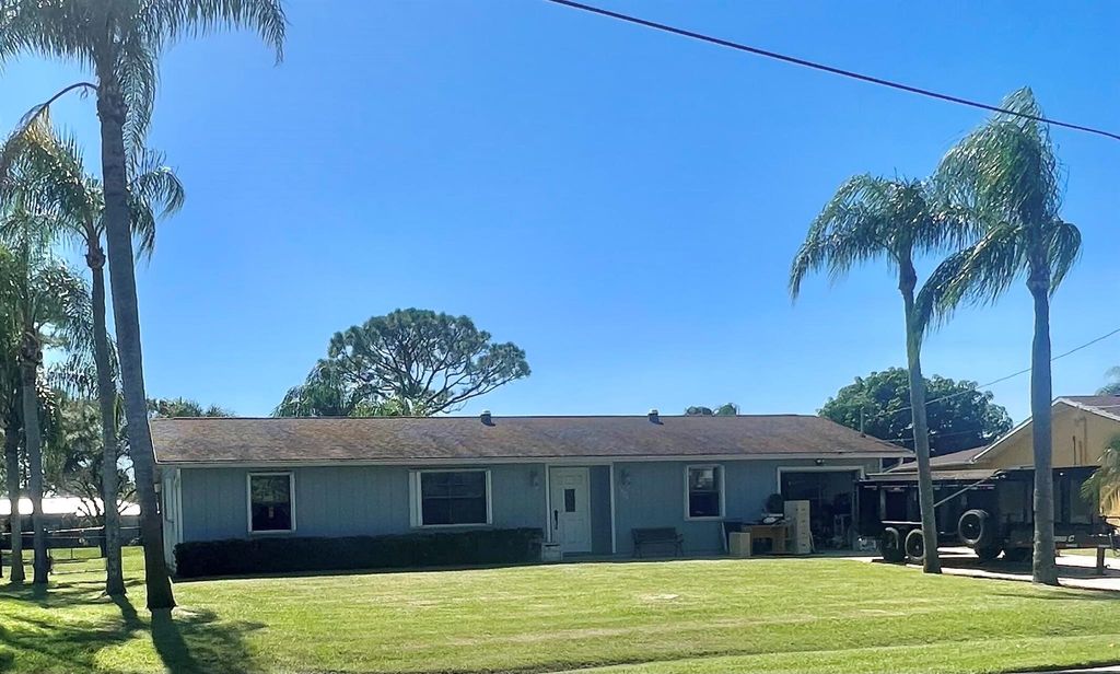 Photo of 1292 SE Mendavia Avenue, Port St Lucie, FL 34952 (MLS # R10930891)