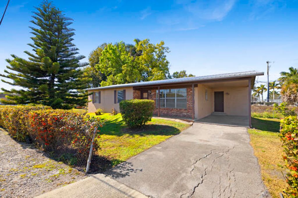 Photo of 110 SW 12th Avenue, South Bay, FL 33493 (MLS # R11160812)