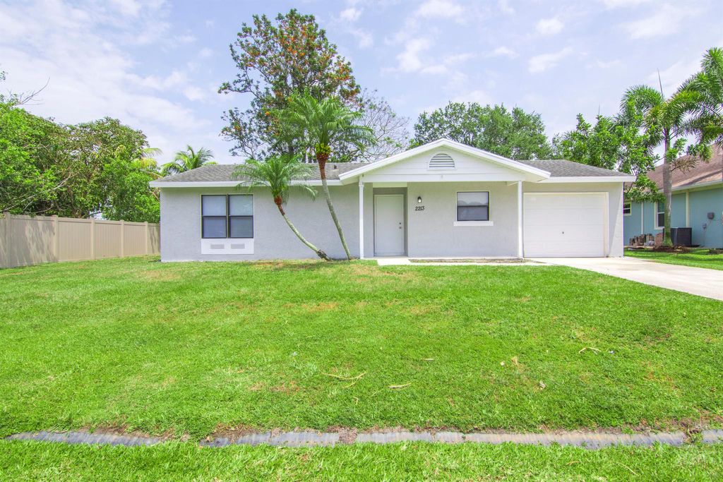 Photo of 2213 SE Short Street, Port Saint Lucie, FL 34952 (MLS # R10981095)