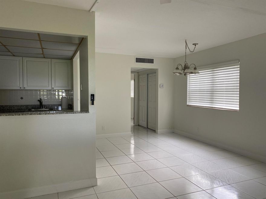 Beautiful - spotless first floor unit - close to main clubhouse - tile thru out - Newer Cabinets, appliances, washer/dryer. This is in mint condition and porch is enclosed for that bonus room.  Living room window faces golf course. New washer/dryer, refrig, hot water. Kings Point is a resort style community with 3 multi million dollar clubhouses, tennis courts, 6 heated pools incl. indoor resistance & lap pools, 2 golf courses (executive & par 3) live theatre with name entertainment, movies,, exercise rooms, card rooms, Bistro, Cafe and courtesy buses daily to shopping. Come see this georgeous corner unit and it's just 6 miles from the ocean & historic downtown Delray Beach....