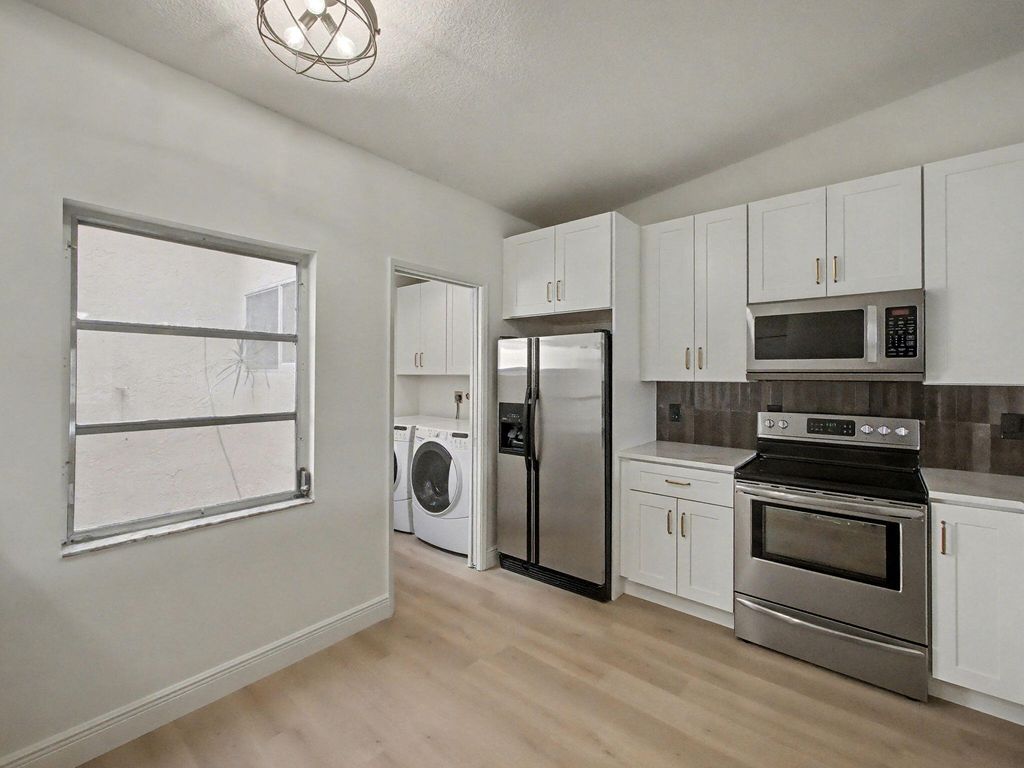 Photo of 8324 Summerbreeze Lane, Boca Raton, FL 33496 (MLS # B26008102)