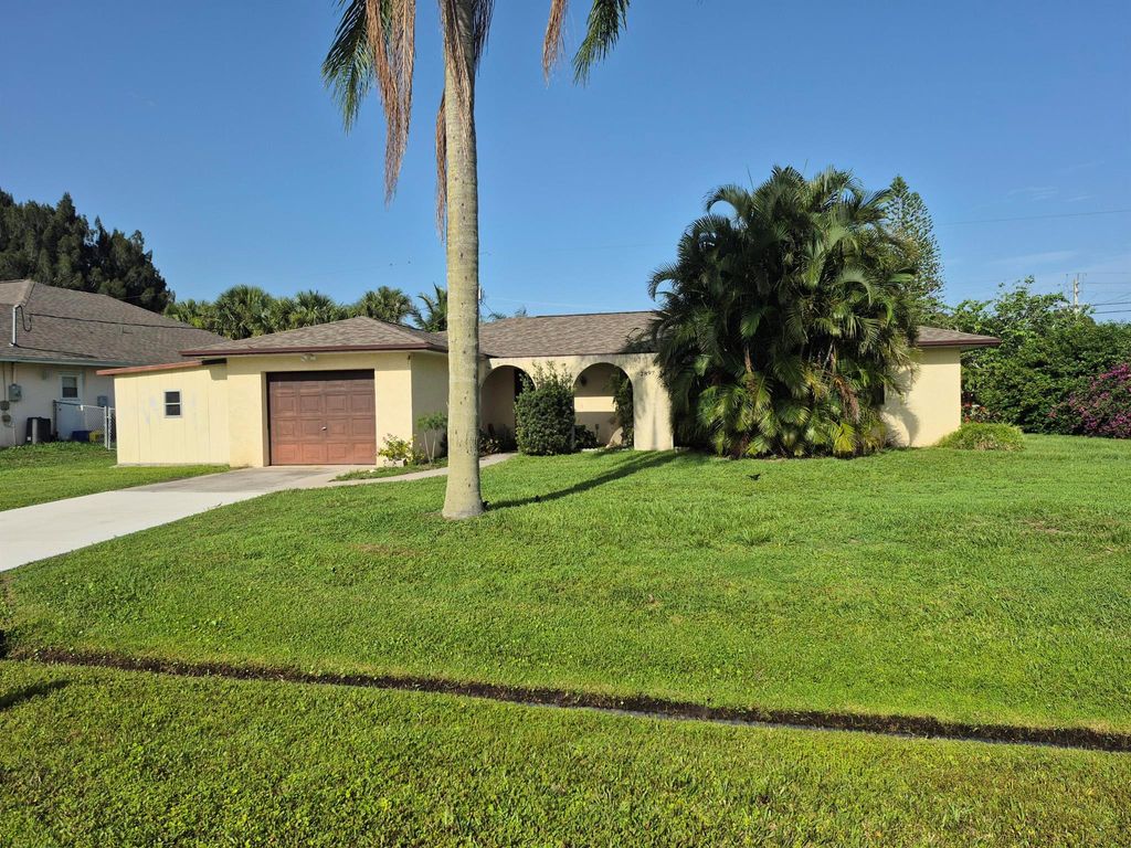 Photo of 2897 SW Ortega Street, Port Saint Lucie, FL 34953 (MLS # R11097412)