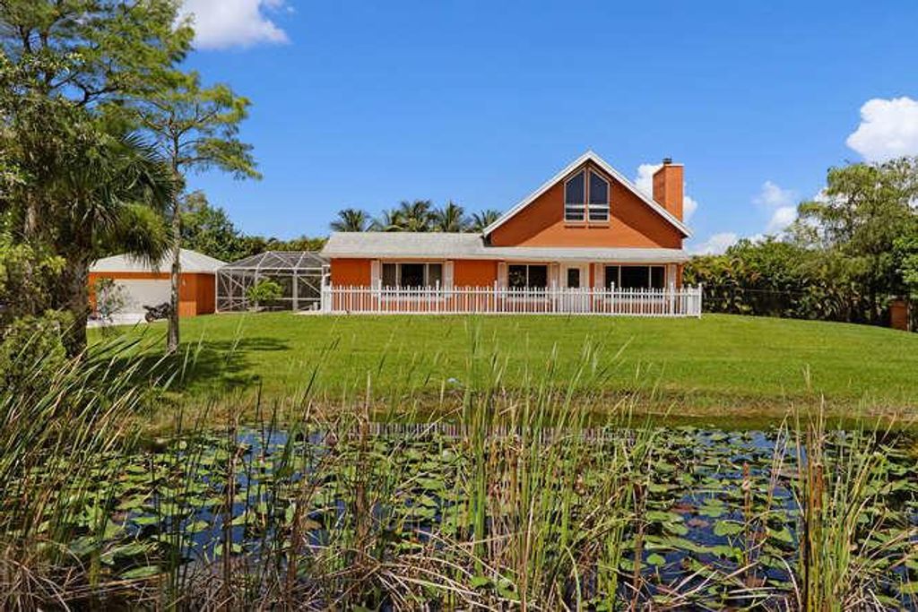 Photo of 15603 85th Avenue Ave N, Palm Beach Gardens, FL 33418 (MLS # R10671029)