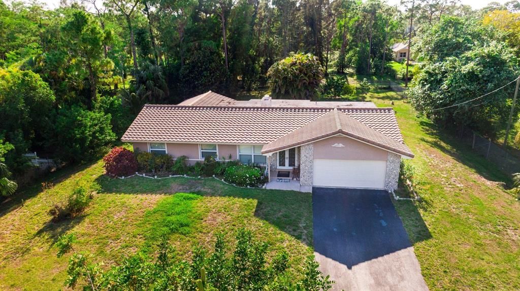 Photo of 5909 NW 71st Terrace, Parkland, FL 33067 (MLS # R10705729)