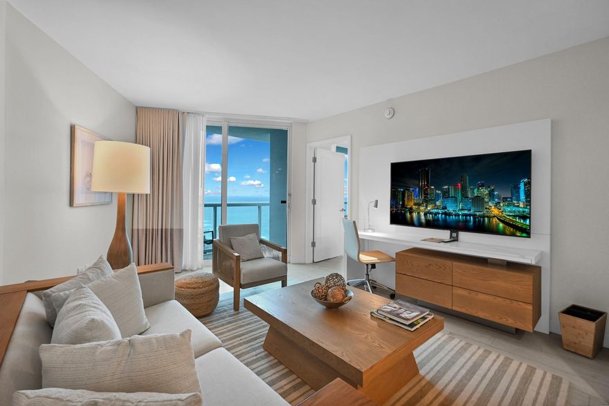 Welcome to your dream beachfront retreat!  This fully furnished one-bedroom, one-bath condo-hotel unit with tastefully decorated living space features high-end furnishings, creating an atmosphere of relaxation and sophistication.  The bedroom is a sanctuary of tranquility, boasting a plush king-size bed for a restful night's sleep. What sets this property apart is not just the stunning interiors, but also the resort-style amenities that come with it. Take a dip in the heated pool or unwind in a hot tub as you soak in the warm Florida sunshine.  The adjacent beach offers direct access to the ocean.  Enjoy a range of amenities that elevate your experience, including fitness facilities, concierge services, and convenient access to nearby dining and entertainment options.