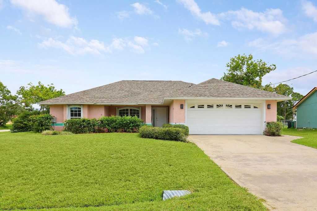 Photo of 4451 NW Gimlet Avenue, Port Saint Lucie, FL 34983 (MLS # R10996714)