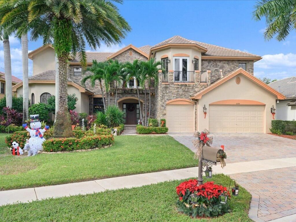 Photo of 10596 Versailles Boulevard, Wellington, FL 33449 (MLS # R11061514)