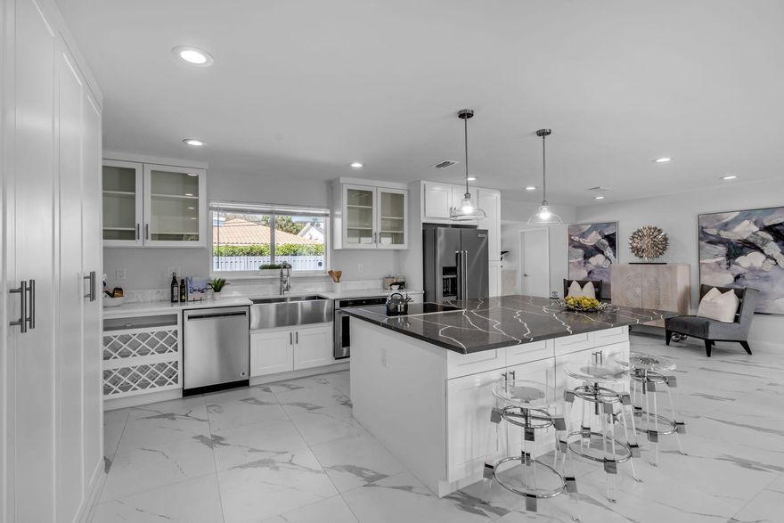 Beautifully updated 4BR/2.5BA pool home in a prime East Boca Raton non-HOA community. This bright, move-in-ready residence features recent upgrades, sparingly used Kitchenaid appliances, a functional split floor plan, and spacious living areas ideal for families or entertaining. Enjoy a private backyard with a sparkling pool, plus A-rated schools and quick access to beaches, Mizner Park, dining, shopping, parks, and major routes. Non-gated and no HOA--offering flexibility and the freedom to make it your own. A rare East Boca opportunity with lifestyle, convenience, and value all in one.