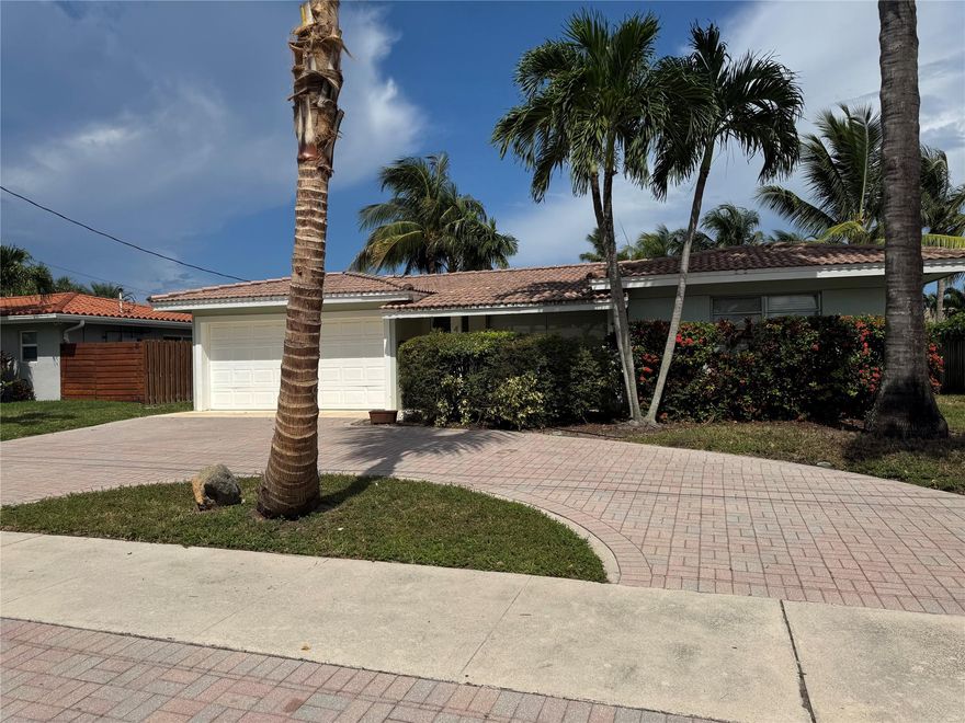 This beautiful furnished 3/2 waterfront pool home in Garden Isles is being offered furnished with a newly renovated kitchen and bathrooms.  Enjoy the heated pool while you watch the boats sail by.  Perfect backyard for grilling and entertaining.  Wonderful owners who have put in a lot of love into their home for your enjoyment.  Great location with a Publix down the street, Jack's Hamburger house at walking distance, and other nearby shops and restaurants.  Pictures don't do the place justice.  Must see to appreciate.  Easy to show.  Please text me for showing instructions.