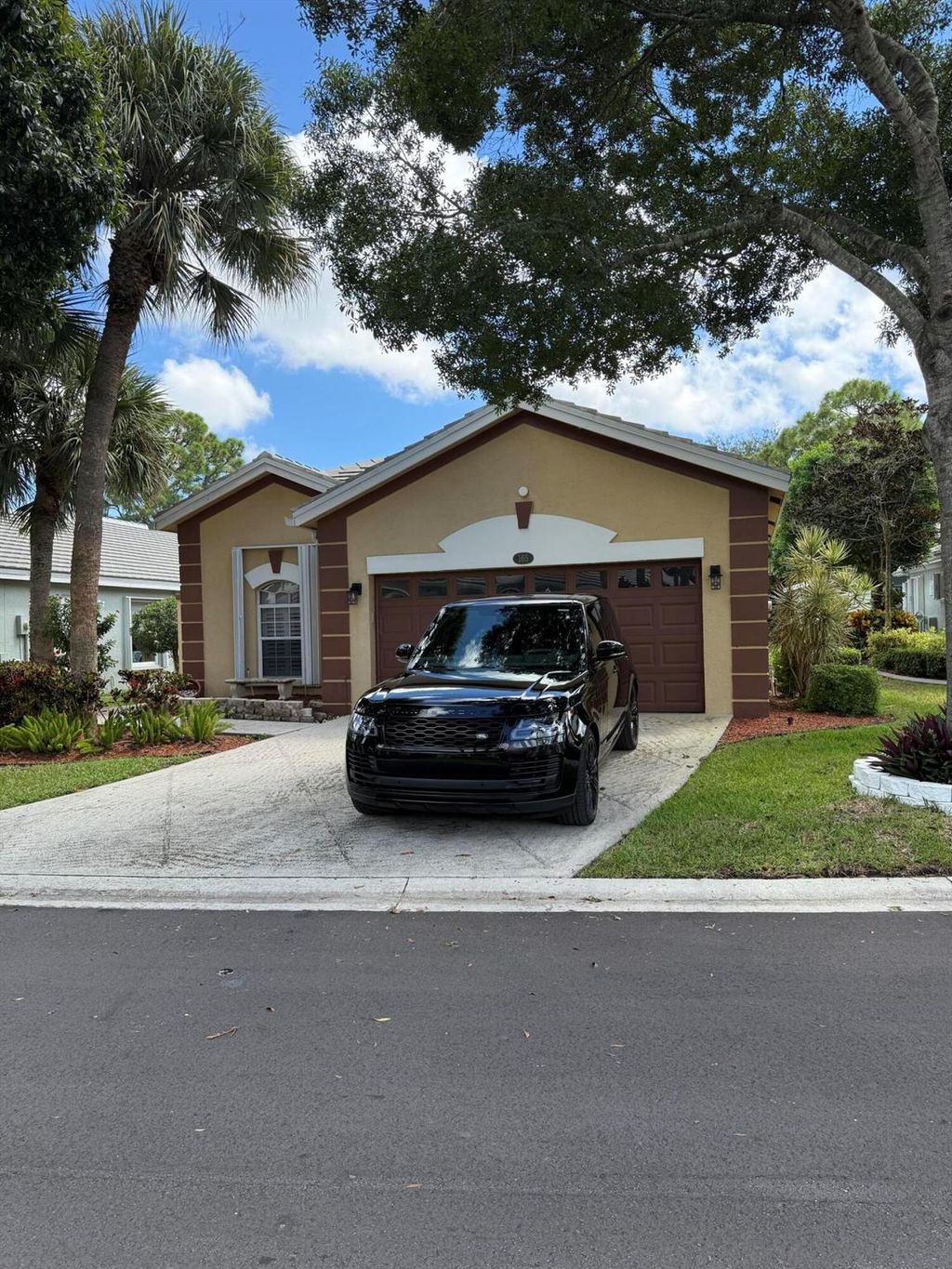 Photo of 165 Harbor Lake Circle, Greenacres, FL 33413 (MLS # R11122506)