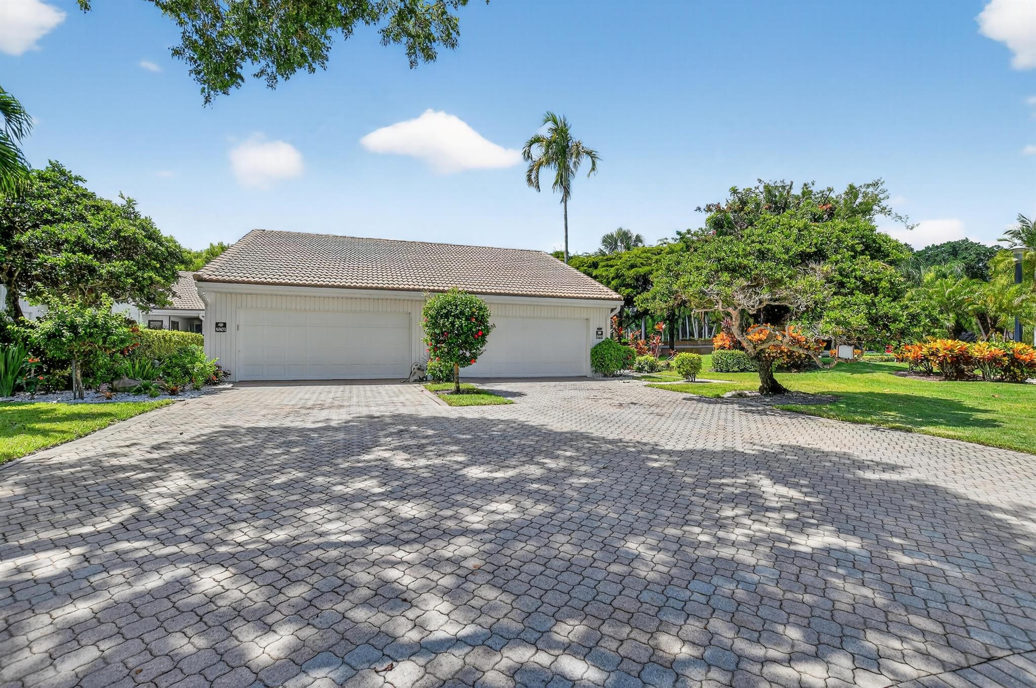 SPACIOUS AND IMMACULATE 3 BEDROOM, 2 BATH CORNER VILLA. OFFERING A TRANQUIL PRIVATE GARDEN SETTING. 2 CAR GARAGE. LOCATED ACROSS FROM SUBDIVISION POOL. BOCA WEST OFFERS 4 GOLF COURSES, 27 TENNIS COURTS , 14 PICKLEBALL COURTS. 5 STAR FITNESS CENTER , POOL , SPA AND SALON. 8 DIFFERENT DINING VENUES.MANDATORY JOINING FEE $150,000 , BWMA CAPITAL CONTRIBUTION $10,000 , ANNUAL DUES $24,454