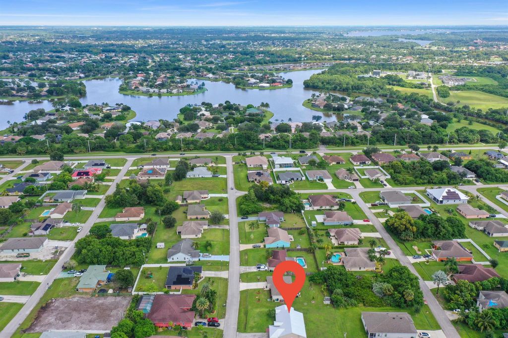Photo of 466 SW Prater Avenue, Port St Lucie, FL 34953 (MLS # R10920613)