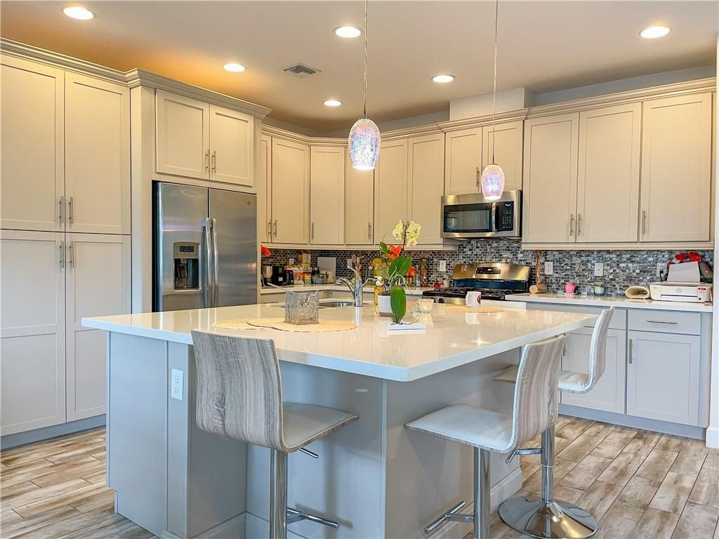 Photo of 12512 NW 32 Mnr, Sunrise, FL 33323 (MLS # F10541553)