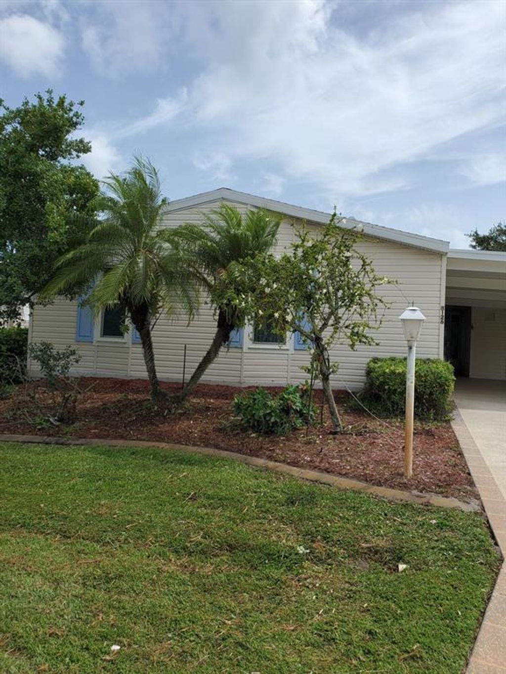 Photo of 8126 9th Hole Drive Dr, Port Saint Lucie, FL 34952 (MLS # R10826746)
